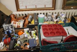 FOUR TRAYS OF CERAMICS AND SUNDRIES to include rubber cake trays (trays not included)