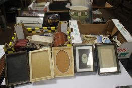 TWO BOXES OF COLLECTABLES TO INCLUDE, a leather cased trio of bottles, a small barometer, two Ronson