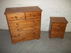 A PINE FIVE DRAWER CHEST AND A PINE THREE DRAWER CHEST