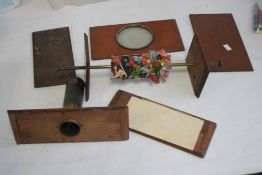AN EDWARDIAN MAHOGANY KALEIDOSCOPE OF BOX FORM, L 23 cm, W 12.5 cm, D 9 cm A/F but complete¦
