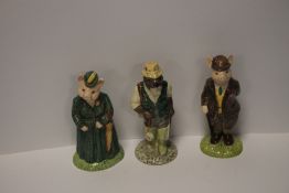 THREE BESWICK FIGURES to include Gentleman Pig, Fisherman Otter and The Lady Pig (3)