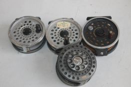 A COLLECTION OF 3 DALWA FLY REELS to include 