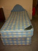 A SINGLE SLIDE STORAGE BED AND HEADBOARD