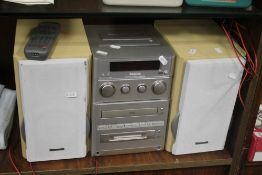 A PANASONIC STEREO AND SPEAKERS