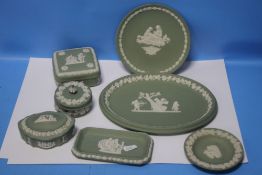 A SMALL COLLECTION OF GREEN WEDGWOOD JASPERWARE to include trinket boxes