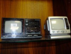 A VINTAGE PORTABLE TV RADIO CASSETTE PLAYER TOGETHER WITH ANOTHER PORTABLE TV RADIO (2)