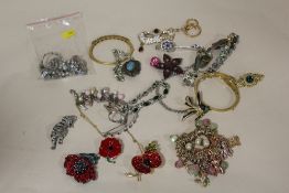 A QUANTITY OF COSTUME JEWELLERY