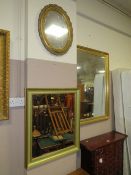 TWO MODERN RECTANGULAR FRAMED MIRRORS TOGETHER WITH AN OLDER OVAL SHAPED MIRROR (3)