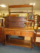 AN ANTIQUE OAK DRESSER WITH THREE DRAWERS W 137 CM
