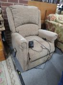 A CELEBRITY ELECTRIC RISE/RECLINE ARMCHAIR