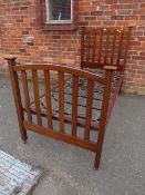 A MAHOGANY INLAID SINGLE BED FRAME WITH SPRUNG BASE