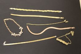 A SMALL COLLECTION OF SILVER GILT NECKLACES ETC.