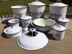 A QUANTITY OF ENAMEL WARE TO INCLUDE LARGE FLOUR AND BREAD BIN, TWO SMALLER FLOUR AND A SAGO TIN,