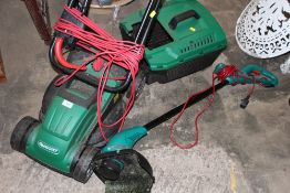 AN ELECTRIC QUALCAST LAWNMOWER TOGETHER WITH A BOSCH ELECTRIC STRIMMER