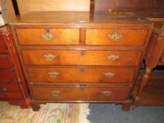 AN ANTIQUE OAK AND MAHOGANY CROSS BANDED FIVE DRAWER CHEST A/F - W 107 cm