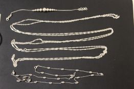 A SMALL QUANTITY OF SILVER CHAINS ETC.