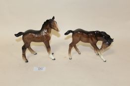 TWO LARGE BESWICK FOALS