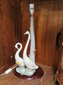 A NAO TABLE LAMP ON STAND