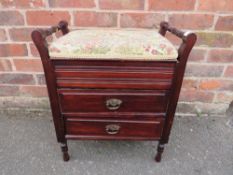 AN EDWARDIAN BOX TYPE PIANO STOOL