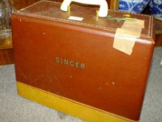 A CASED SINGER SEWING MACHINE