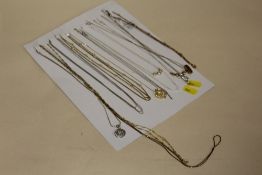 A CARD OF MAINLY SILVER NECKLACES AND CHAINS AND PENDANTS