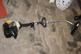 A RYOBI PETROL STRIMMER