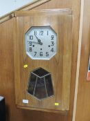 A LARGE WESTMINSTER DECO WOODEN CLOCK