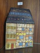 A VINTAGE MATERIAL FOLK ART HOUSE
