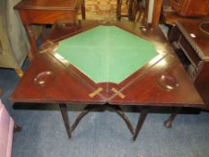 AN EDWARDIAN MAHOGANY HANDKERCHIEF TABLE