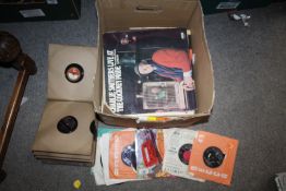 A BOX OF LP RECORDS AND 7