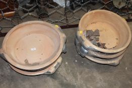 SIX SHALLOW CERAMIC PLANTERS