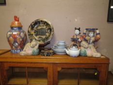 TWO MODERN CHINESE/ ORIENTAL HAND PAINTED FIGURES HOLDING BOWLS WITH ORANGE BACK STAMPS TALLEST HEI