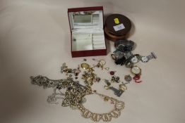 TWO SMALL BOXES OF COSTUME JEWELLERY AND WRIST WATCHES