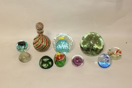 A SELECTION OF DECORATIVE GLASS PAPERWEIGHTS