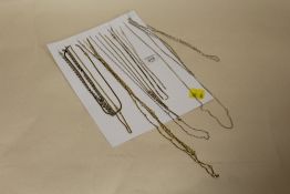 A CARD OF MAINLY SILVER NECKLACES AND CHAINS