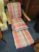 A VINTAGE OAK BARLEYTWIST RECLINING ARMCHAIR CIRCA 1920'S