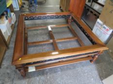 A LARGE MODERN REPRODUCTION COFFEE TABLE - MISSING GLASS TOP A/F 130 X 130 CM