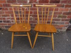 A PAIR OF ERCOL STICK BACK DINING CHAIRS