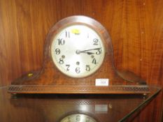 AN OAK CASED NAPOLEON HAT CLOCK