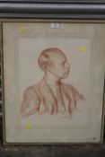 A FRAMED AND GLAZED PENCIL SKETCH PROFILE PORTRAIT SIGNED LOWER RIGHT - OVERALL SIZE 67CM X 54.5CM