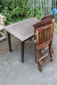 A SMALL GARDEN TABLE WITH TWO CHAIRS, PLUS A SMALL SELECTION OF GARDEN TOOLS