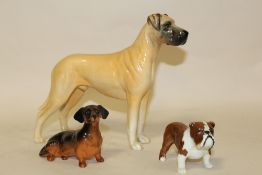 THREE BESWICK DOG FIGURES - GREAT DANE, DACHSHUND AND BULLDOG