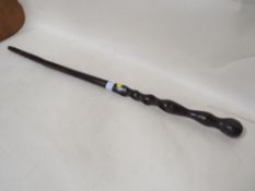AN AFRICAN WOODEN CEREMONIAL STAFF
