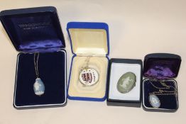 A BAG OF WEDGWOOD NECKLACES