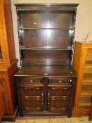 A SMALL DARK OAK DRESSER W-91 CM