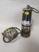 A VINTAGE MINER'S LAMP AND A SHIP'S LAMP