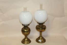 A PAIR OF OIL LAMPS