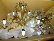 A GILT METAL FIVE BRANCH LIGHT FITTING TOGETHER WITH THREE SIMILAR TWO BRANCH WALL FITTINGS