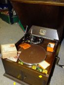 A HMV GRAMOPHONE WITH NEEDLES ETC.