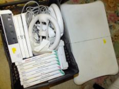 A NINTENDO WII CONSOLE COMPLETE WITH GAMES ETC.